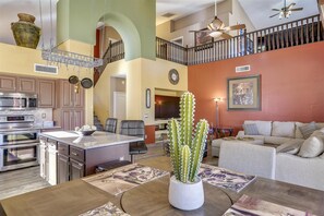 Smart TV, fireplace, books, offices