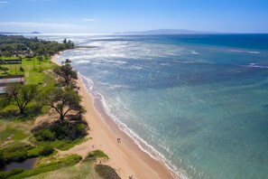 On the beach, sun-loungers, beach towels
