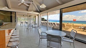A modern bar area with a view of the beach and ocean. - Spacious 1BD w Exclusive Beach Cabana - Maui Eldorado K104 (Lahaina)