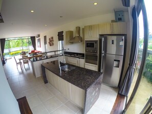 Family Villa | Private kitchen | Full-size fridge, microwave, oven, stovetop