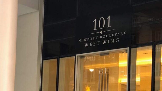 A building entrance with a sign reading "101 NEWPORT BOULEVARD WEST WING". - Favila Condotel Unit at 101 Newport Boulevard (Pasay)