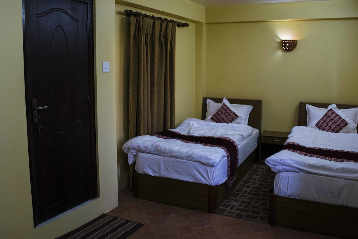 Basic Double or Twin Room, 2 Single Beds, Smoking | Blackout curtains, rollaway beds, free WiFi