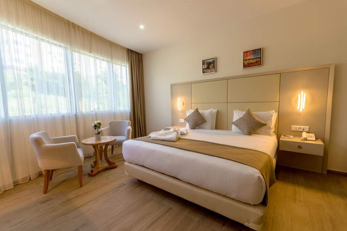 Ropa de cama de alta calidad y minibar
