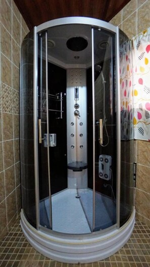 Shower, free toiletries, hair dryer, towels