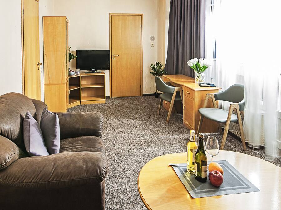 Desk, blackout drapes, soundproofing, iron/ironing board