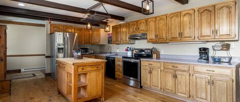 Legacy West | Private kitchen | Full-sized fridge, oven, stovetop, dishwasher