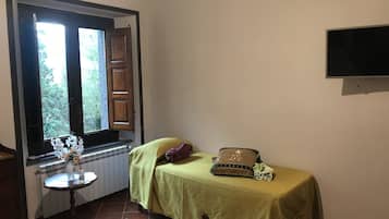 Triple Room, Garden View | 1 bedroom, in-room safe, bed sheets