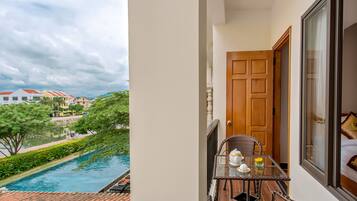 Family Room, Balcony, City View | Minibar, desk, blackout curtains, free WiFi