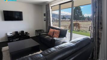 House, 5 Bedrooms, Lake View | Living room | Flat-screen TV, fireplace, DVD player