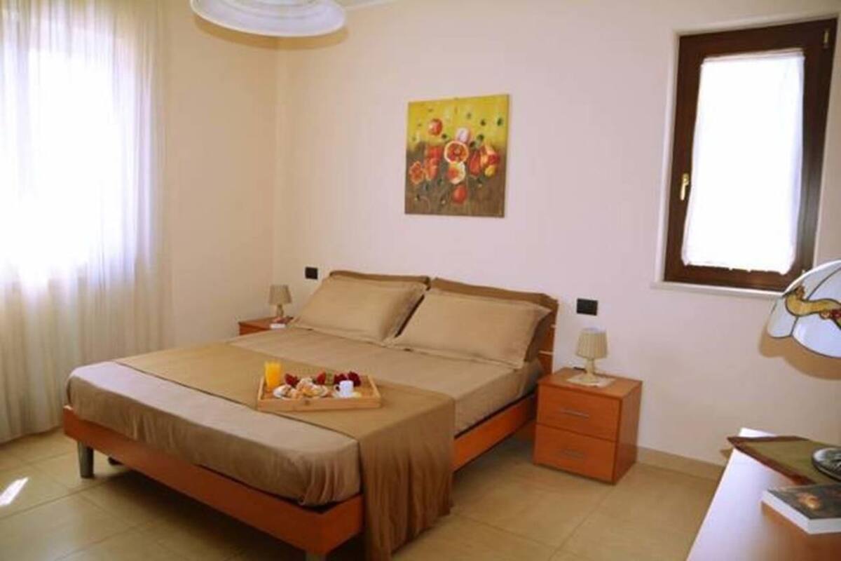 Quadruple Room, Garden View | 2 bedrooms, rollaway beds, free WiFi, bed sheets