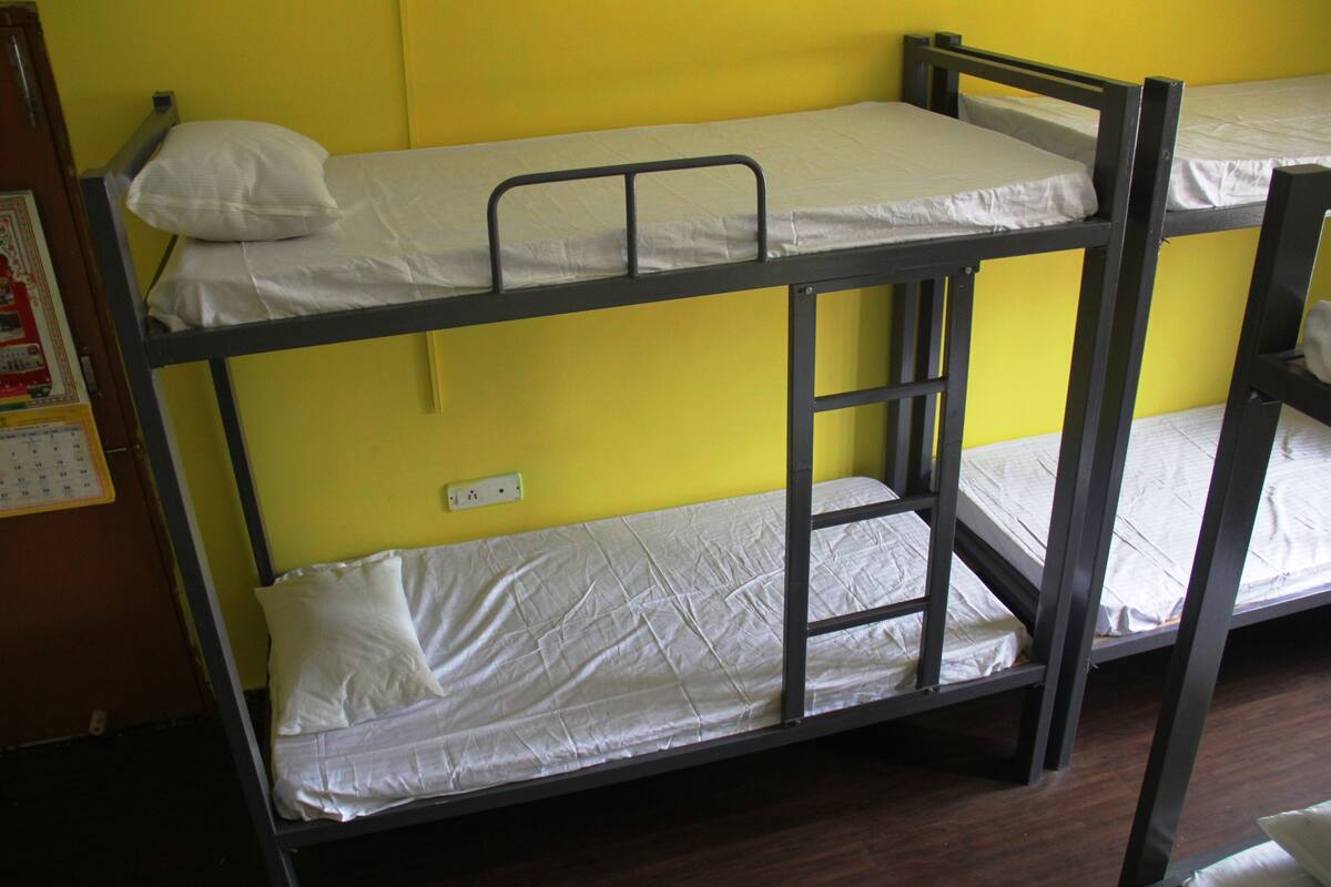 Premium bedding, memory-foam beds, blackout curtains, soundproofing