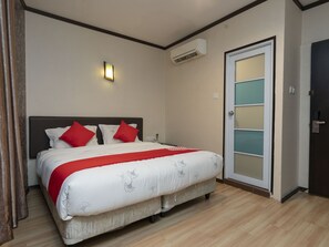 Standard-Doppelzimmer, 1 King-Bett | Zustellbetten, kostenloses WLAN, Bettwäsche