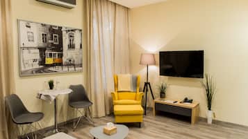 Apartamento standard, cozinha americana | Comodidades do quarto