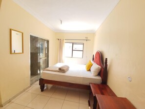 Premium bedding, individually furnished, desk, laptop workspace