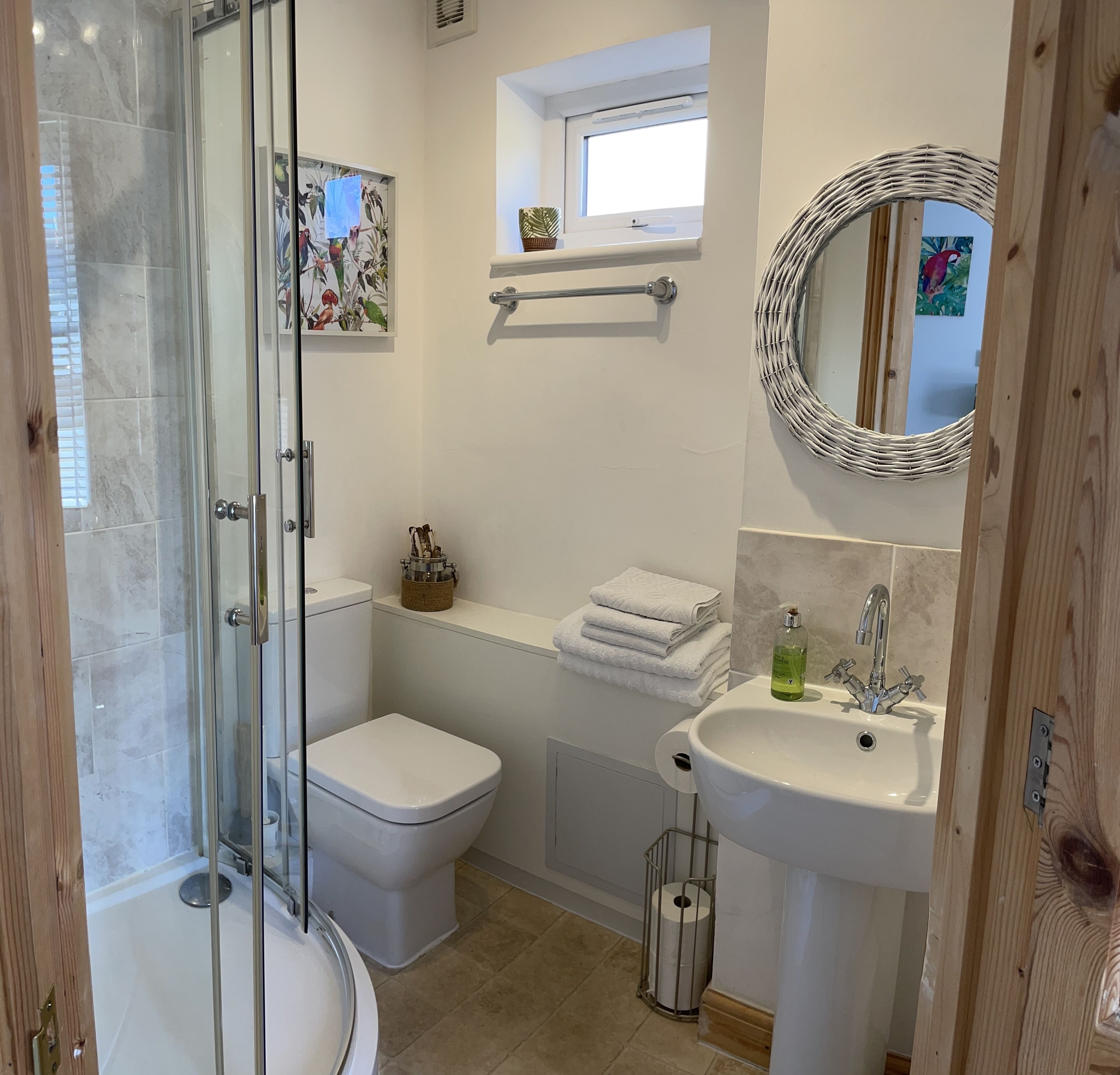 Shower, hair dryer, towels, soap