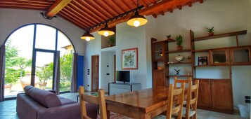 Villa, 2 Bedrooms, Kitchen, Poolside | Living area | Flat-screen TV