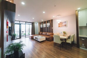 3 bedroom deluxe apartment | Living area | Smart TV