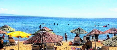 Private beach, sun loungers, beach umbrellas