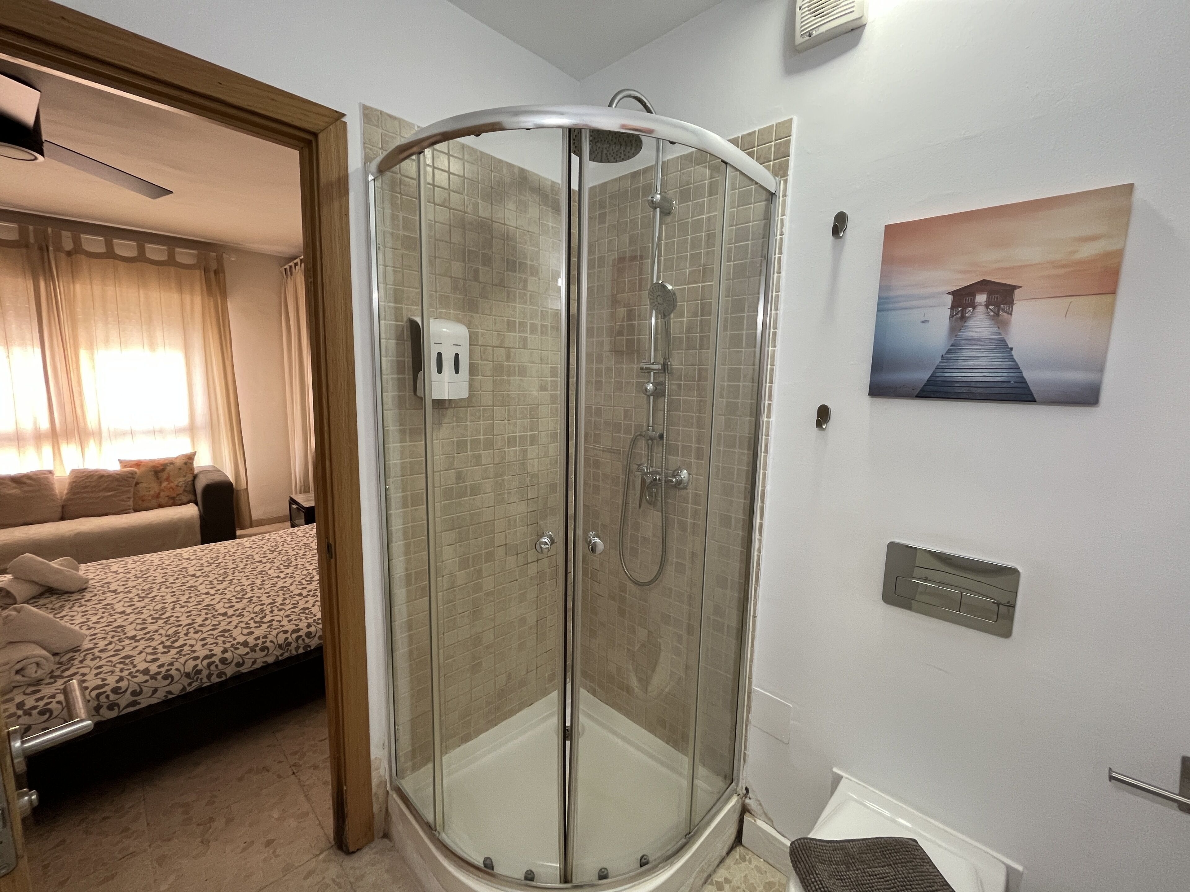 Basic Suite, Private Bathroom | Bathroom | Shower, rainfall showerhead, hair dryer, towels