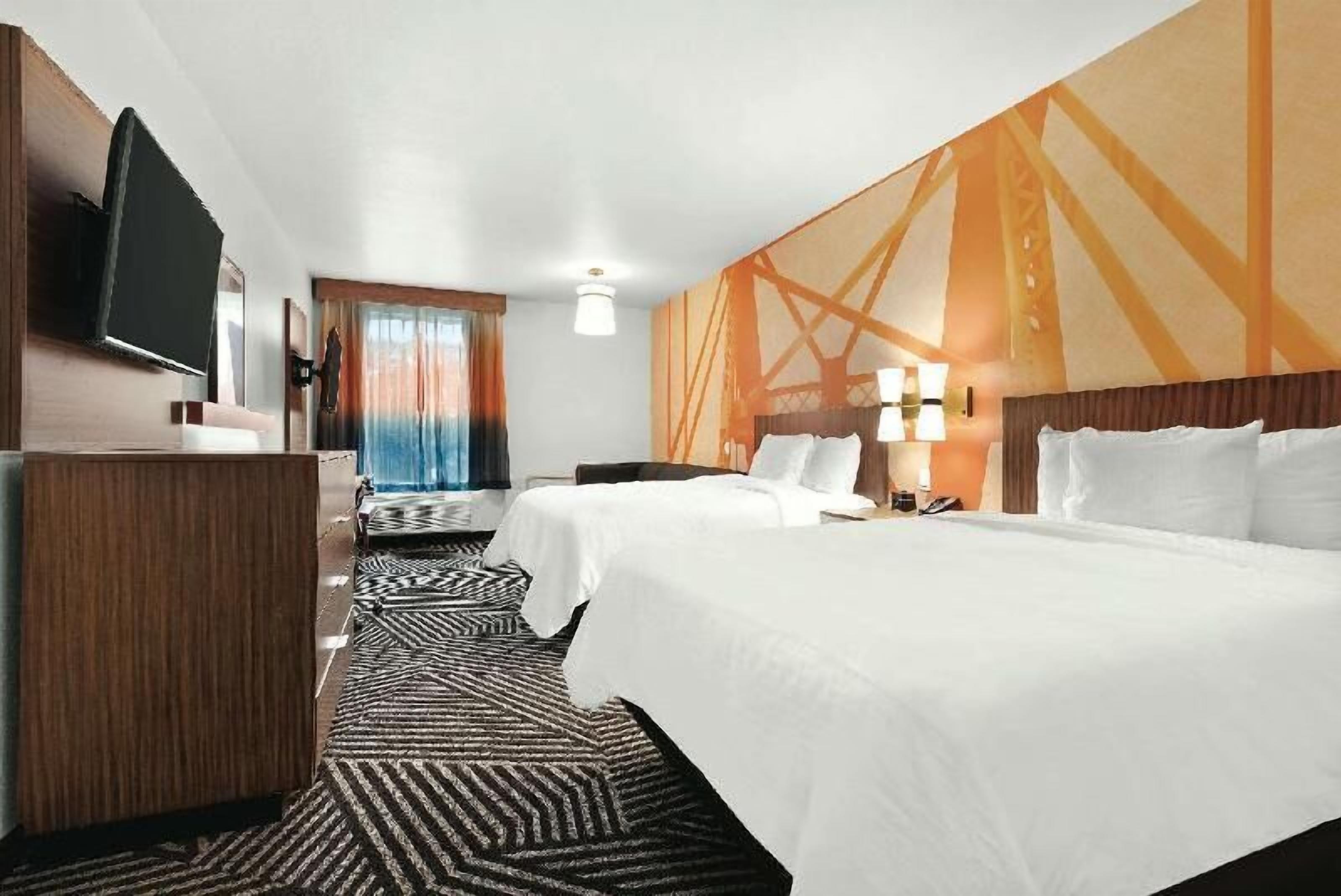 Down duvets, pillow-top beds, desk, free WiFi