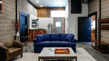The Industrial, No Pets Allowed | Living area | Flat-screen TV