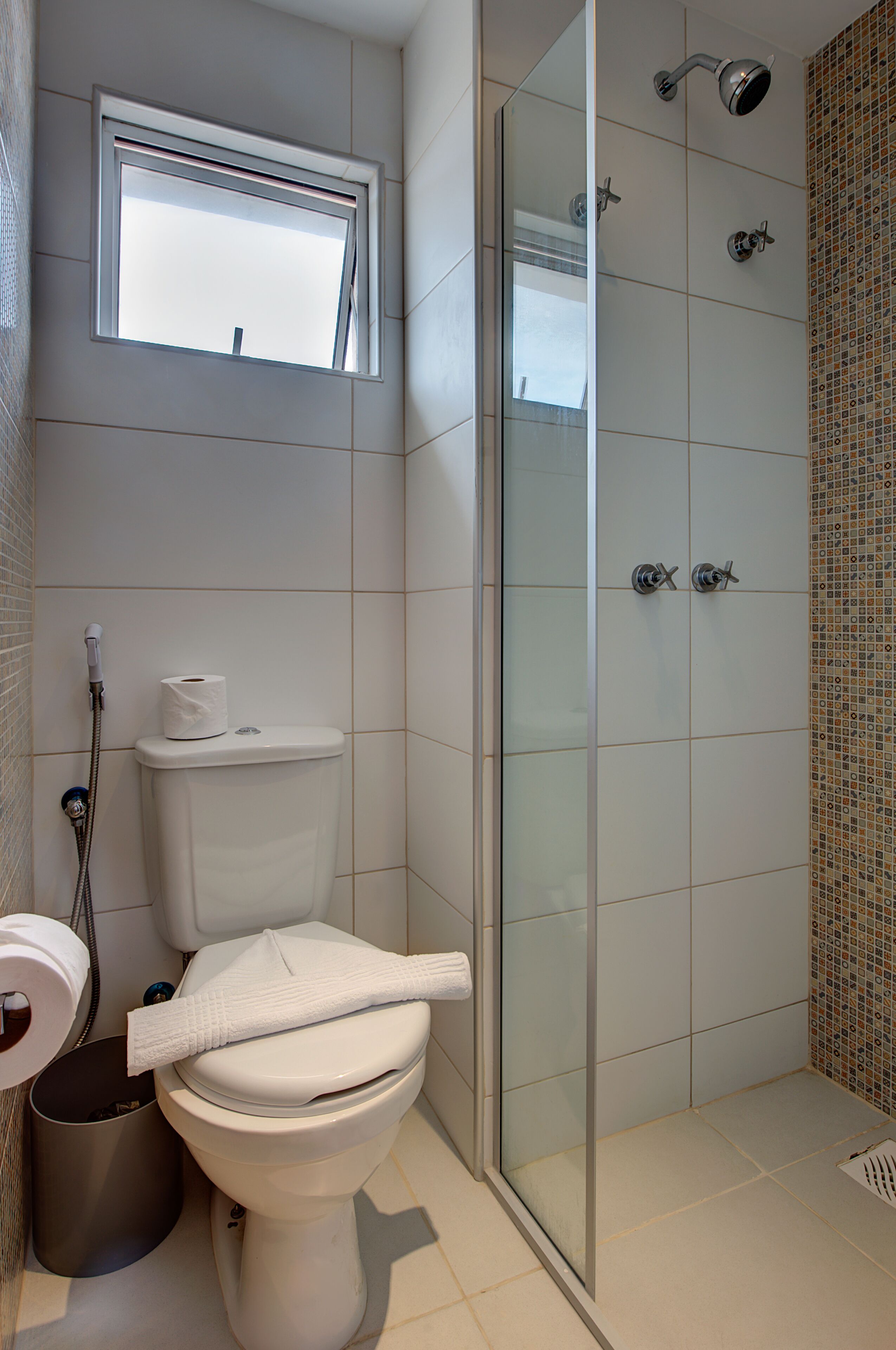 rainfall showerhead, designer toiletries, hair dryer, towels