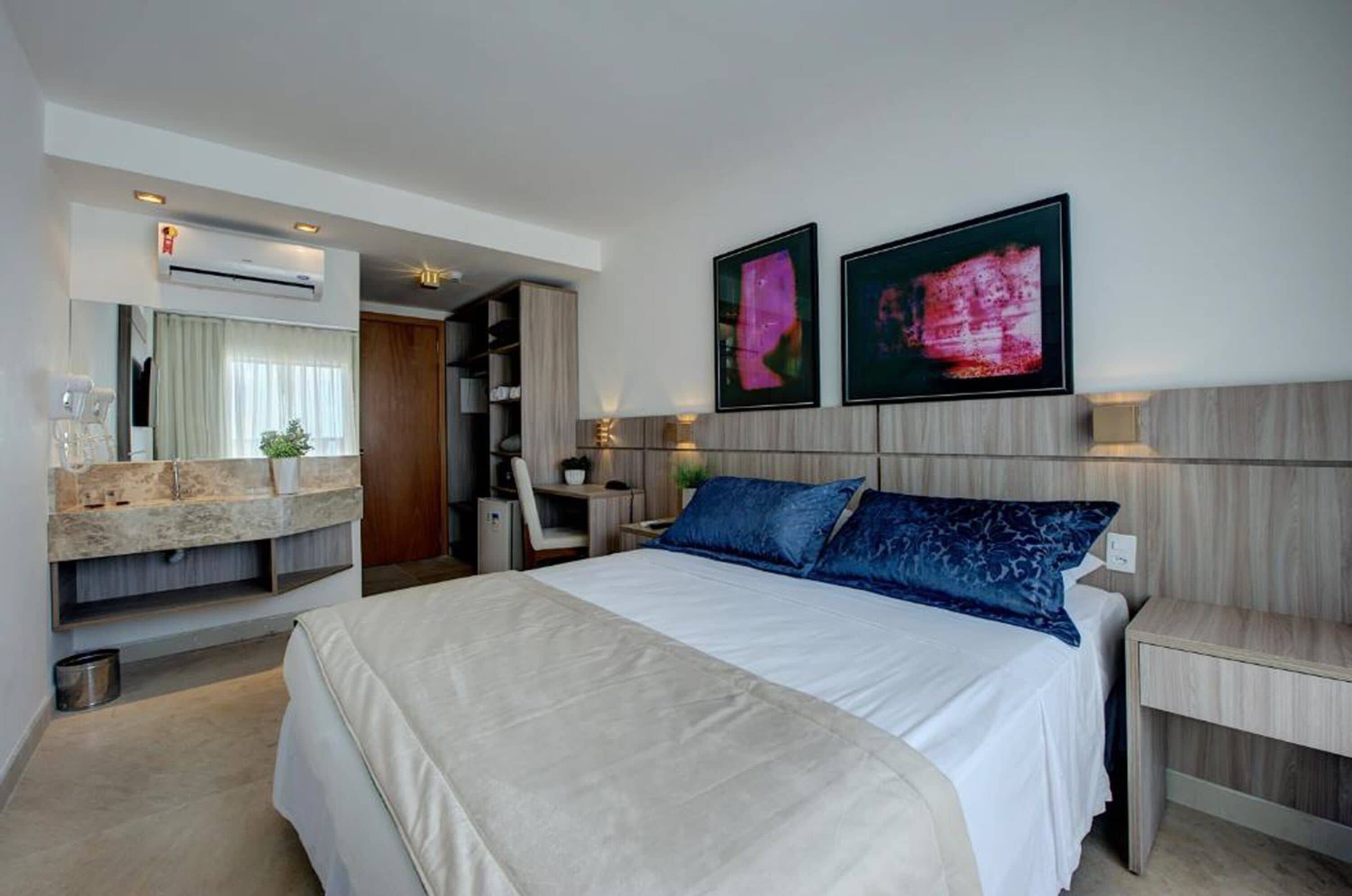 deluxe double room, sea view | minibar, in-room safe, desk, blackout curtains