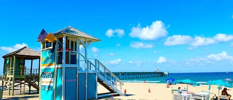 Beach nearby, white sand, sun loungers, beach umbrellas