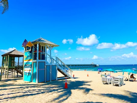 Beach nearby, white sand, sun loungers, beach umbrellas