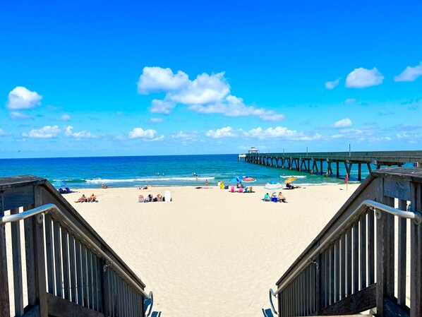Beach nearby, white sand, sun loungers, beach umbrellas