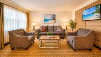 Deluxe Apartment, 1 Bedroom | Living area | Flat-screen TV