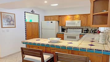 Family Villa, 3 Bedrooms | Private kitchen | Full-sized fridge, microwave, stovetop, coffee/tea maker