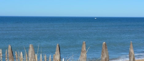 On the beach, sun-loungers, beach towels