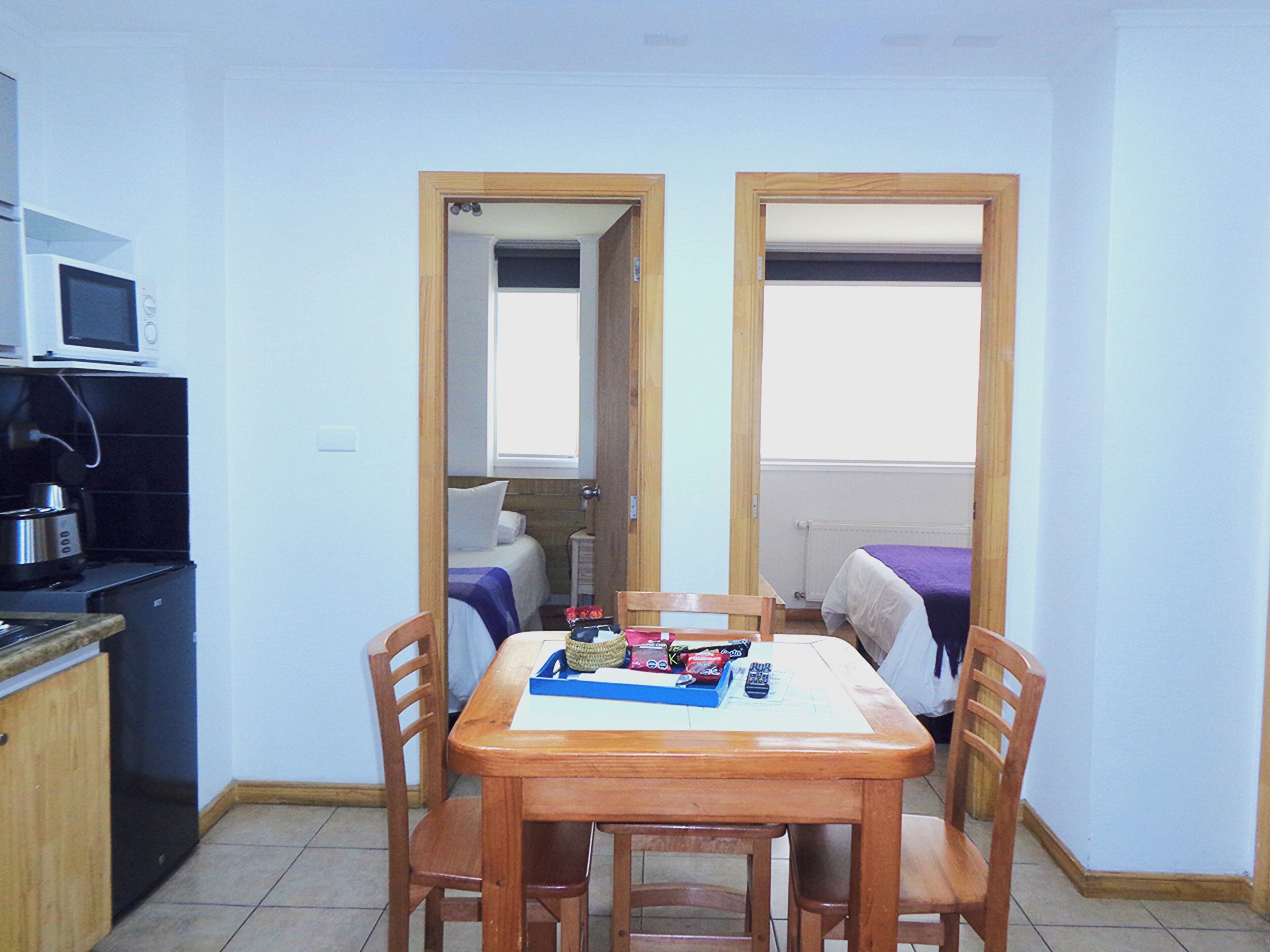 Standard Apartment, 2 Bedrooms, Kitchenette | Living area | Flat-screen TV