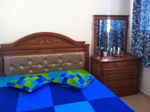 2 bedrooms, blackout curtains, soundproofing, iron/ironing board