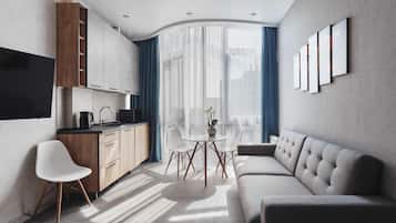 Luxury Apartment, Beachfront | Ruang tamu | 50 inci sebuah televisyen pintar dengan kabel, TV