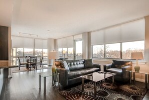 Luxury Apartment, 2 Bedrooms | Living room | Flat-screen TV, pay movies - Bluebird Suites in Reston (Reston)