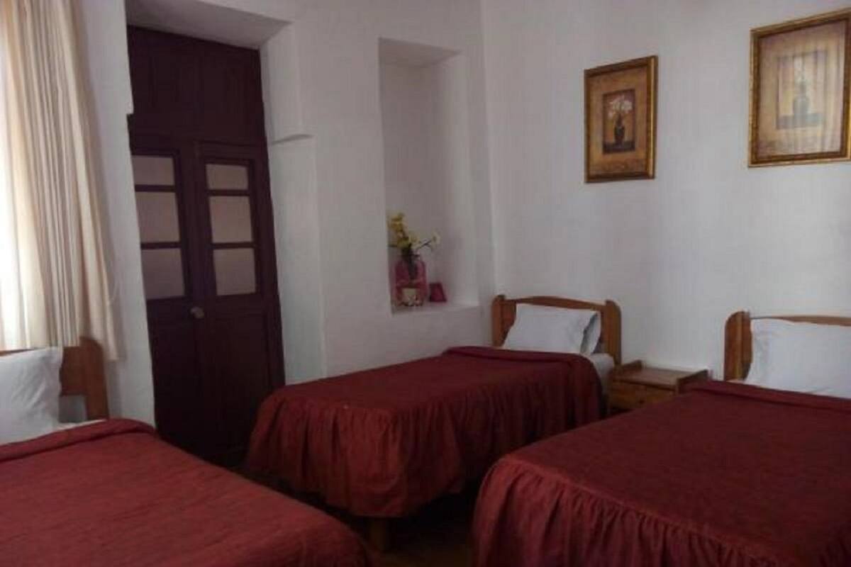 Chambre triple, salle de bain privée | Accès au Wi-Fi (inclus)