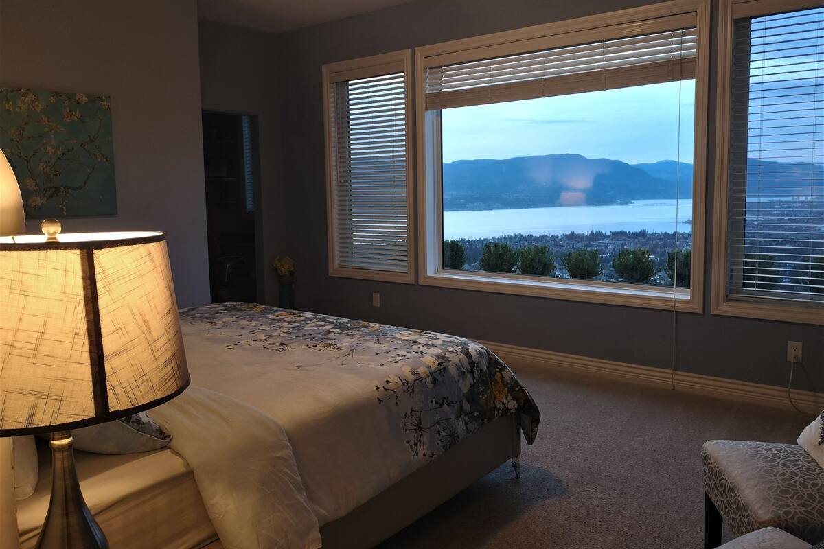 Premium bedding, desk, laptop workspace, soundproofing