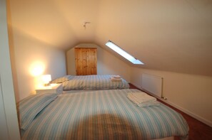 Twin beds in the 'triple bedroom'