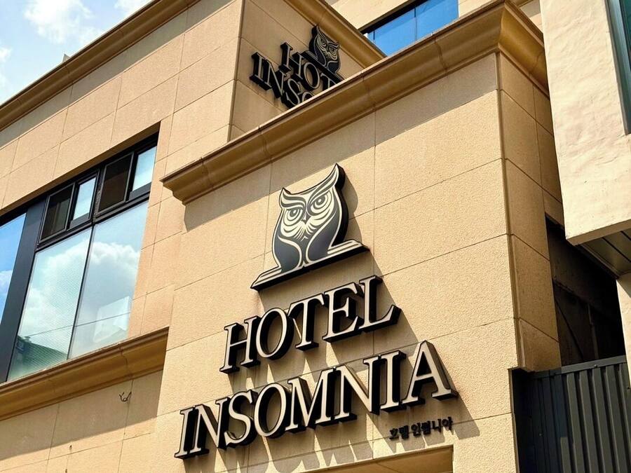 Premium bedding, memory foam beds, laptop workspace, blackout drapes