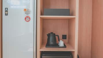 Premium bedding, memory-foam beds, laptop workspace, blackout curtains