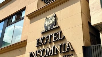 Premium bedding, memory foam beds, laptop workspace, blackout drapes