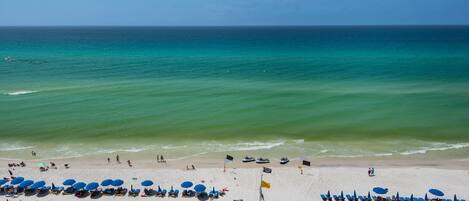 On the beach, sun-loungers