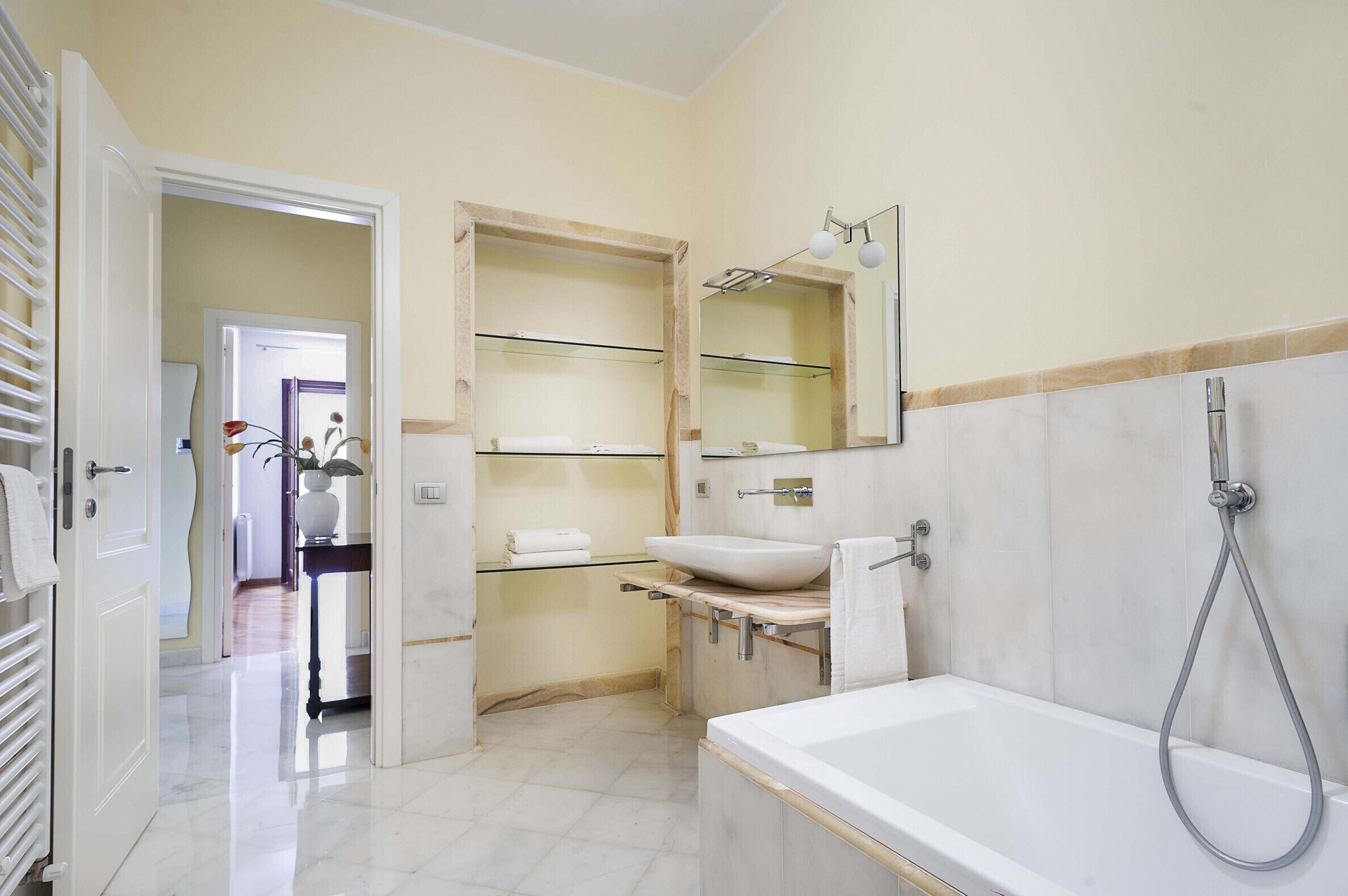 Bathtub, hair dryer, towels