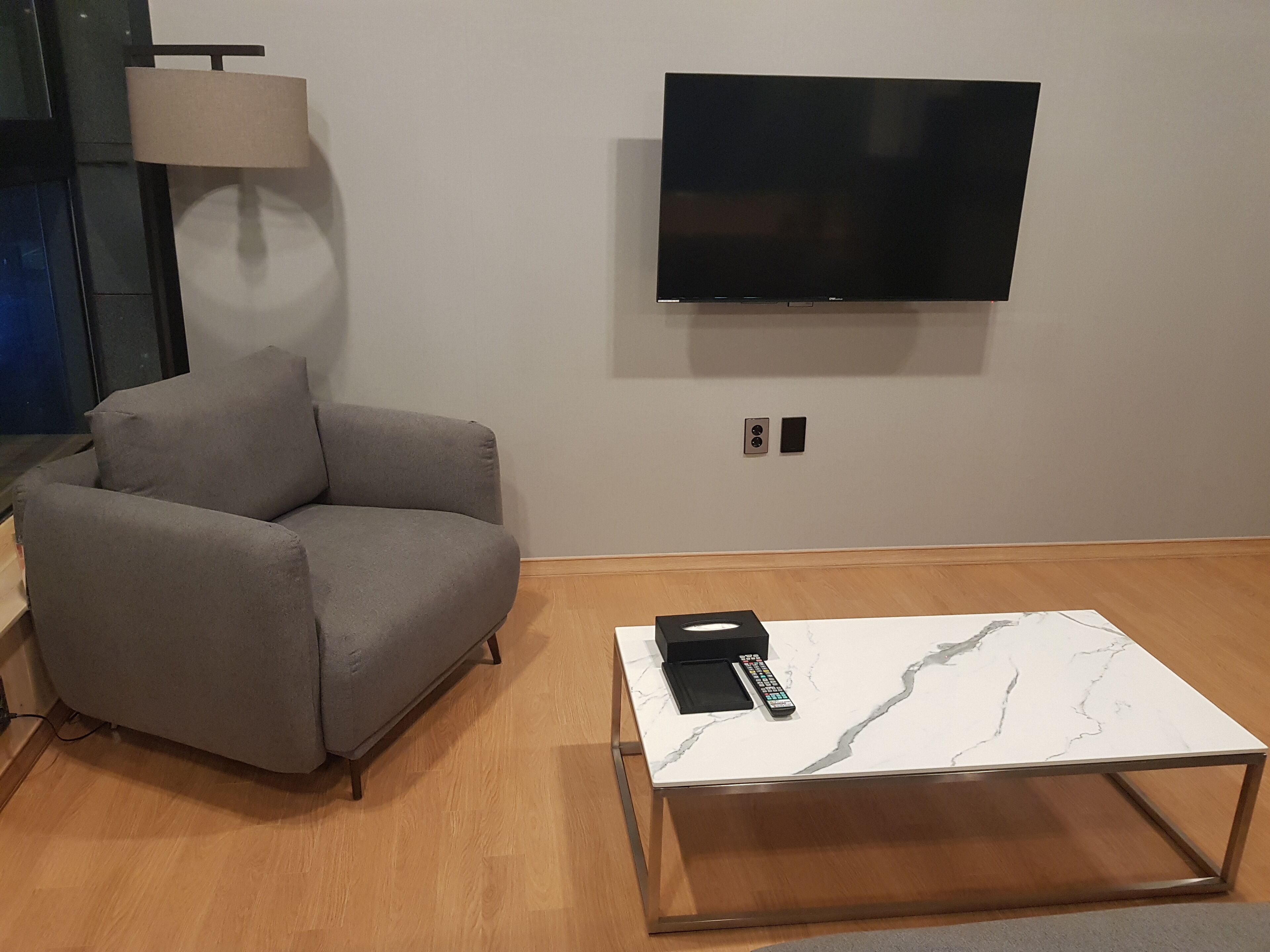 family villa | living area | flat-screen tv