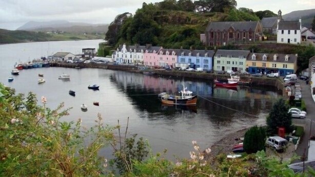 A harbor with boats, colorful buildings, and a church. - SPACIOUS FAMILY FRIENDLY - AMAZING SEA VIEWS - SLEEPS 4-6 (Isle of Skye)
