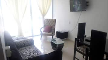 Apartamento Amoblado  | Area keluarga | TV layar datar