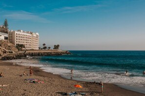 On the beach, beach towels