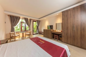 Bungalow, Balcony, Pool View | Minibar, in-room safe, desk, blackout drapes - La Paloma Resort (Phu Quoc)